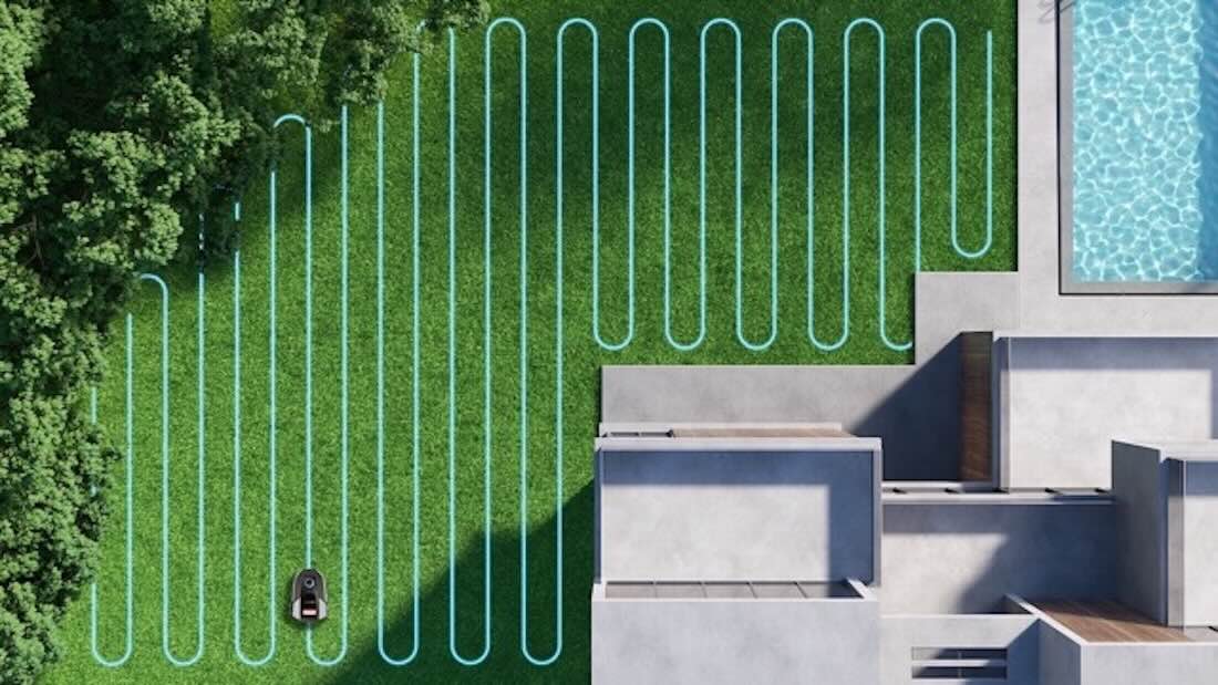 Robotic Lawn Mower Cutting Grass